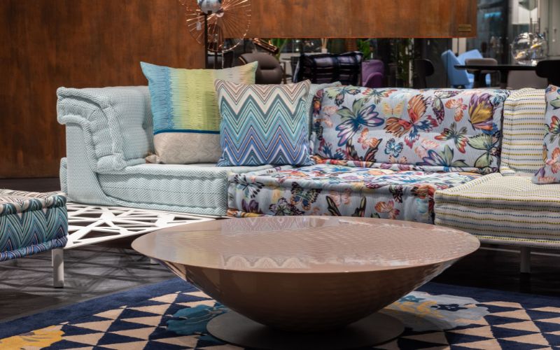 Colorful cushion styling on sofa Indian living room